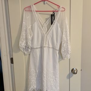 Lacy bell sleeve mini dress